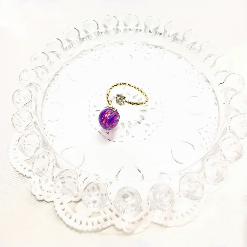 Pinky ring using purple Kyoto opal